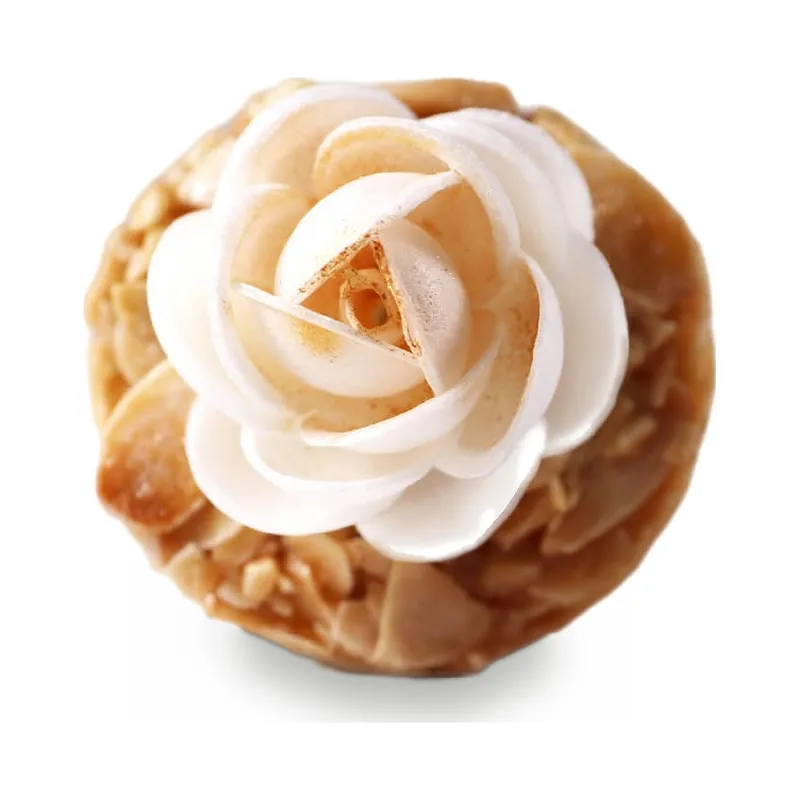 An almond florentine topped with a sugar rose